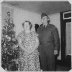 Grandma Miller and Uncle Vernie by the same Christmas tree. (1951)