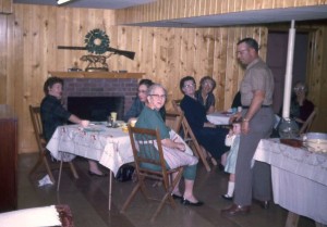 Christmas pot-luck dinner, c1962. L to R: Dorothy Humbert, Lucille Bransteter, Amber Oakley, Ercie Ripley, Vergie Buchanan, Rita & Bob Humbert, Ruth Broerien. 