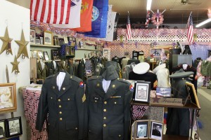 Uniforms, photos, and other items on display at Willshire Home Furnishings. (2015 photo by Karen)