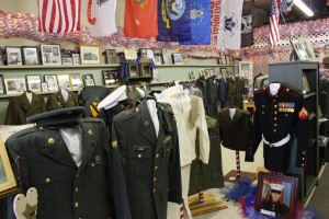 Vast array of uniforms, photos, and other items on display at Willshire Home Furnishings. (2015 photo by Karen)