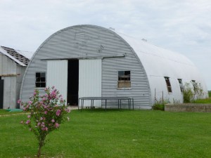 Quonset-hut style barn on former farm of John McGough, built to replace barn destroyed by a tornado in 1948. (2015 photo by Karen)
